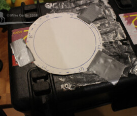 The pattern for the screws. These were measure from the snorkel. When the pattern is in the right position, tape it down and drill the holes through the case. img 5195