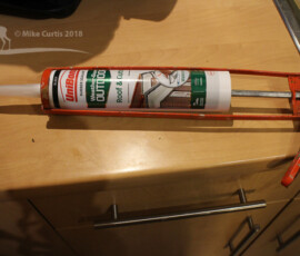 Black, outdoor, silicon sealant to waterproof the joint between the snorkel and case. img 5202